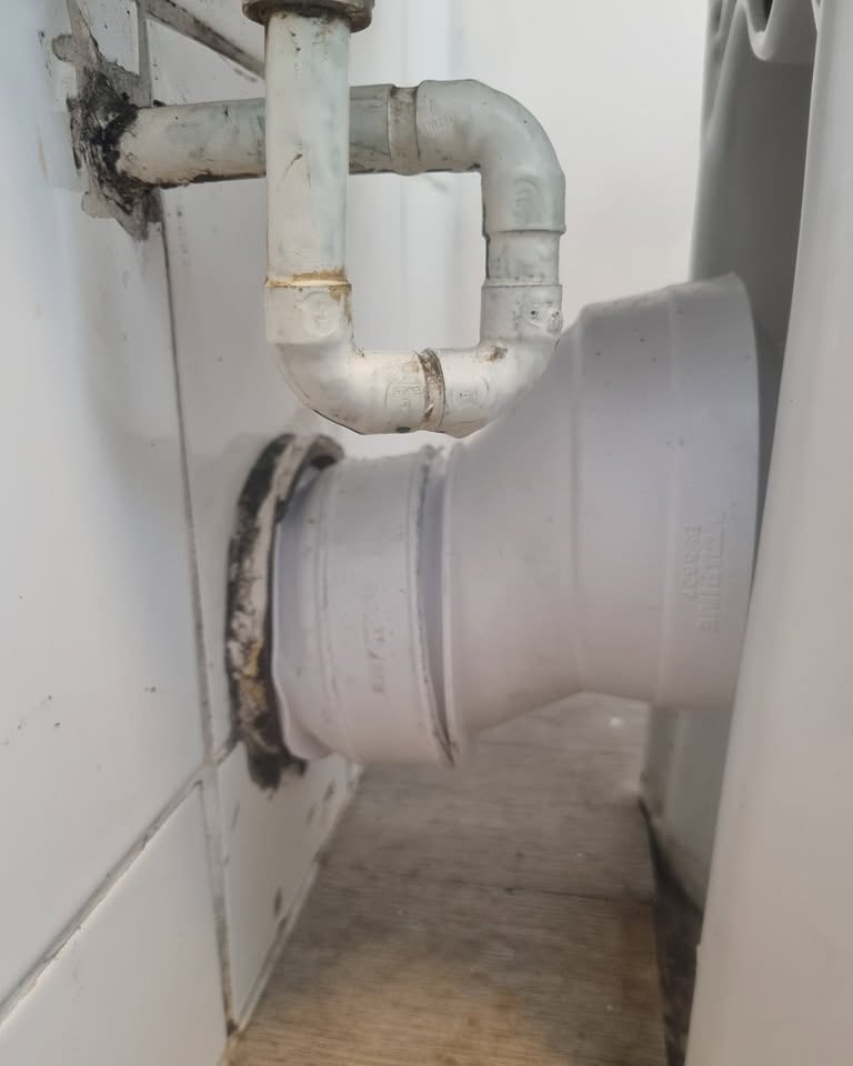 New, clean waste pipe connection after repair